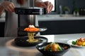 Innovative 3D printing of pasta in a modern kitchen setting, showcasing futuristic food preparation