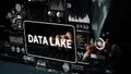 Innovative Data Lake Concept with Dark Background and Hands Typing on Computer Keyboard in Modern Digital Environment Royalty Free Stock Photo