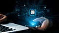 Innovative Digital Technology Concept With Microchip Graphic Displayed Over Smartphone In User Hand And Laptop In Royalty Free Stock Photo