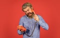 Innovative ideas. Businessman talking on vintage phone in his office. agile business. vintage stationary telephone Royalty Free Stock Photo