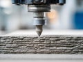 Innovative industrial 3d printer nozzle depositing layers of cement material for advanced construction and manufacturing Royalty Free Stock Photo