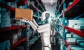 Innovative industry robot working in warehouse for human labor replacement Royalty Free Stock Photo