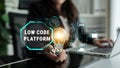 Innovative Low Code Platform Concept with Light Bulb and Data Connections Representing Technology and Digital Royalty Free Stock Photo
