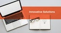 Innovative Solutions Concept with Laptop and Notebook Royalty Free Stock Photo