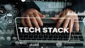Innovative Tech Stack Concept with Hands Typing on Laptop and Digital Data Graphics in Modern Workspace Environment Royalty Free Stock Photo