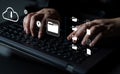 Innovative Technology Concept Featuring Hands Typing on Laptop Keyboard with Digital Cloud Storage Icons and File Royalty Free Stock Photo