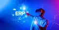Innovative Virtual Reality Experience with ERP Integration Featuring User Interacting with Dynamic Graphics and Business Royalty Free Stock Photo