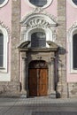 Facade and portal of Hospital Church of the Holy Spirit on Maria Teresa Street, Innsbruck, Austria