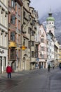 View of Maria Theresa Street with tower of Hospital Church of the Holy Spirit, Innsbruck, Austria