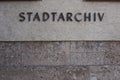 Innsbruck, Austria - March 20.2019: City Archive sign in Innsbruck. German sign. Letters on Building. Stadtarchiv. Documents and