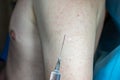 inoculation in the hand, vaccination, injection, syringe in the hands of a doctor, immunization coronavirus