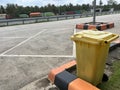 Inorganic organic waste bins of various colors in public places and parking lots