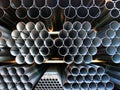 Inox Steel pipes stacked on pile. Royalty Free Stock Photo