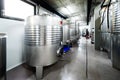 Inox wine barrels stacked in modern winery cellar in Spain Royalty Free Stock Photo