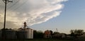 The inpending threat arises prepare grain elevator silo take cover Royalty Free Stock Photo