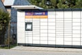 InPost company outdoors parcel locker automated postal box self service mail package collection point closeup