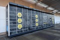 InPost online shopping pickup point with parcel lockers outside supermarket