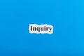 Inquiry text on paper. Word Inquiry on torn paper. Concept Image