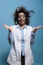 Insane and silly looking crazy scientist with messy hairstyle and dirty face Royalty Free Stock Photo