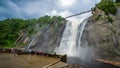 Cloudy summer day with insane view of beautiful and powerful Montmorency waterfall from the bottom
