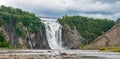 Cloudy summer day with insane view of beautiful and powerful Montmorency waterfall Cloudy summer day with insane view of beautiful