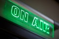 The inscription on air on a green scoreboard of the radio station Royalty Free Stock Photo