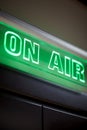 The inscription on air on a green scoreboard of the radio station Royalty Free Stock Photo