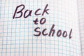 Inscription back to school on a notebook sheet