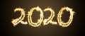 Inscription 2020 from Bengal lights. New Year`s and Christmas concept Royalty Free Stock Photo