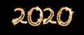 Inscription 2020 from Bengal lights. New Year`s and Christmas concept