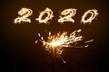 Inscription 2020 from Bengal lights. New Year`s and Christmas concept Royalty Free Stock Photo