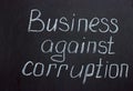 The inscription on the chalk board Business against corruption