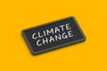 Inscription climate change on chalkboard. Impact of global warming on environment. Negative actions of humanity for climate