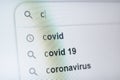 The inscription covid19 in the search bar on the monitor