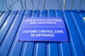 The inscription `customs control zone` in Ukrainian and English. Royalty Free Stock Photo