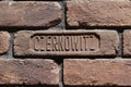 Inscription `Czernowitz` on the old brick wall. Royalty Free Stock Photo