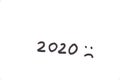 Inscription 2020 in English handwritten in black marker on a white sheet and a sad smiley