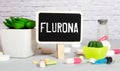 Inscription Flurona Coronavirus infection Covid-19 and flu. Text and lab or laboratory