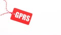 The inscription GPRS General Packet Radio Service on a red price tag on a light background. Advertising concept. Copy space