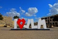 The inscription `I love Jerusalem`, a sculpture decor in the street against the background of old city of Jerusalem, Israel