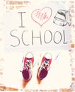 The inscription `I love school`, heart, sneakers and backpack on a piece of paper. The creative school concept on brick wall backg