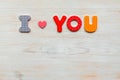 Inscription I love you written in wooden made letters on wood vintage background Royalty Free Stock Photo
