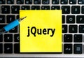 The inscription `jQuery` on a yellow sheet of sticker paper Royalty Free Stock Photo