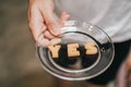 Inscription made of cookies `YES` Plate with alphabet Biscuits on wooden table Royalty Free Stock Photo