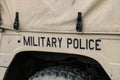 Inscription of military police on the side of a army cargo supply truck Royalty Free Stock Photo