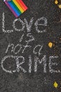 inscription on the pavement love is not a crime