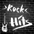 The inscription - Rock Hits and Guitar on a brick wall