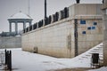 Inscription in Russian Hydrometeorological point on the embankment of the Amur River. Water level marks of the river in Royalty Free Stock Photo