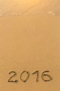 2016 - inscription on sand beach