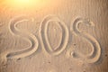 The inscription on the sand beach SOS Royalty Free Stock Photo